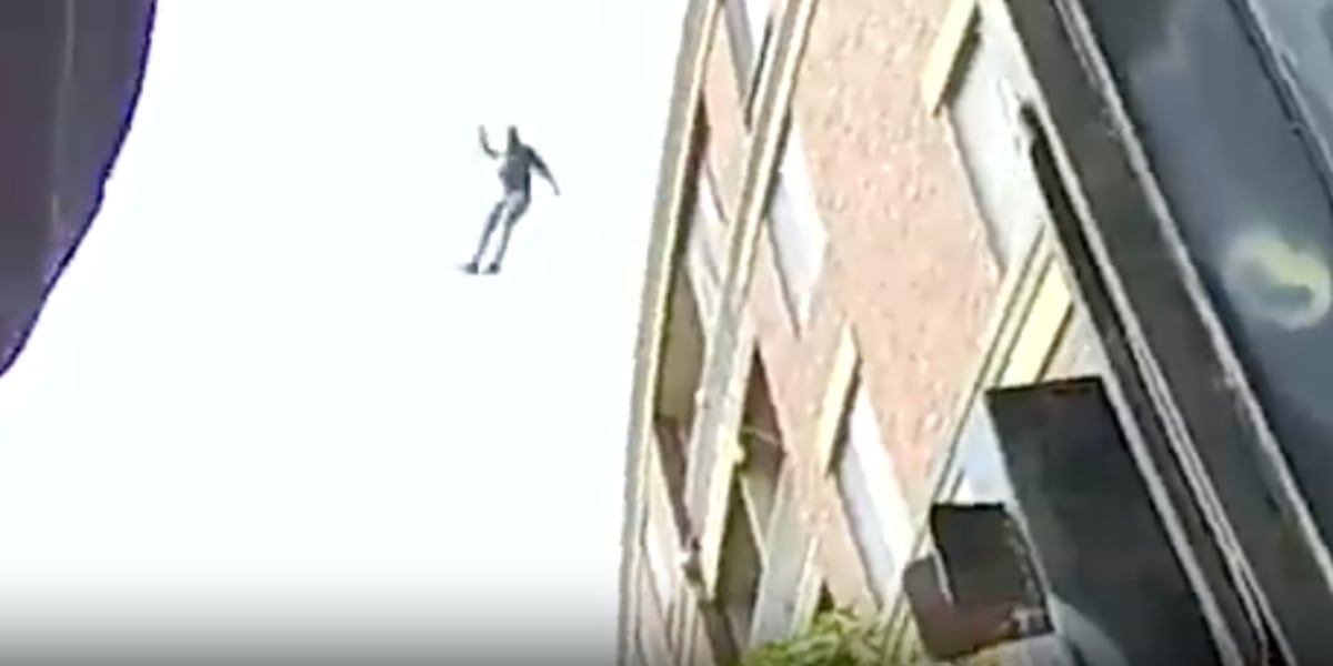 Robber Escaping GRAPHIC: Robbery suspect makes massive jump off building in attempt to ...