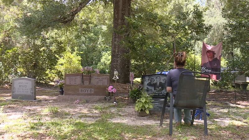 Kelli Boyd visiting her son in Micanopy Historic Cemetery near her Gainesville home.