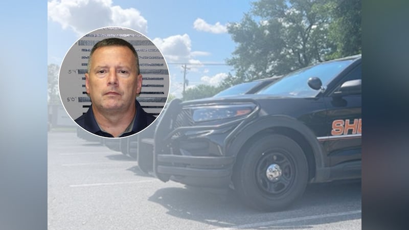 Former county sheriff's office chief deputy Ron James is accused of trading departmental...