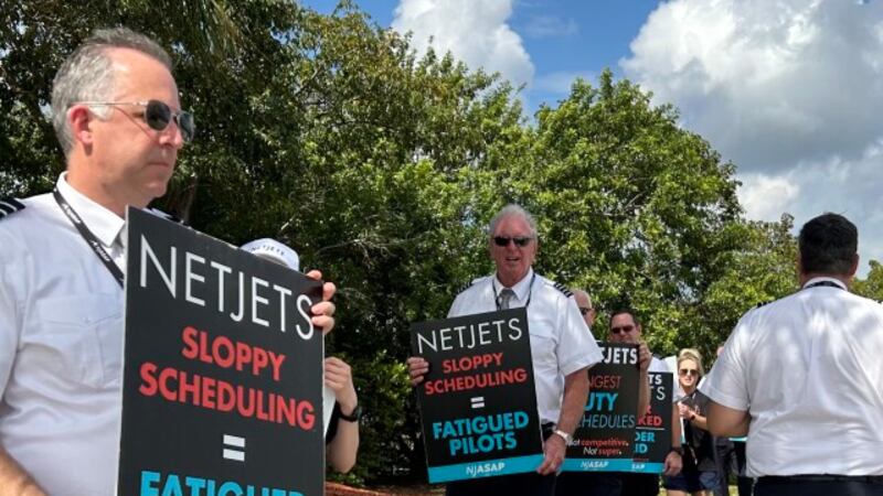 Net Jet Staff NetJets pilots picketing for better wages and quality of life, union VP ...